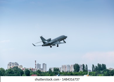 Small Private Business Jet Taking Off From The City Airport