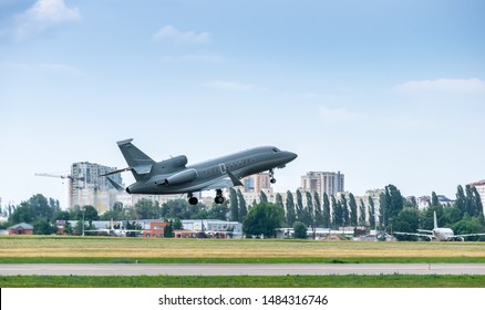 Small Private Business Jet Taking Off From The City Airport