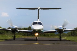 Small Private Twin-engine Piston Aircraft On Runway