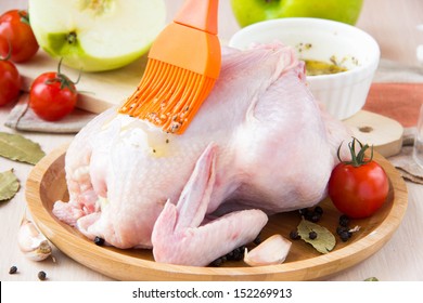 Small Raw Chicken Stuffed With Green Apples Smear Brush Sauce