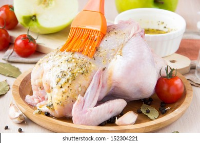 Small Raw Chicken Stuffed With Green Apples Smear Brush Sauce