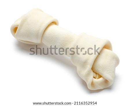 Small Rawhide Dog Bone Cut Out on White.