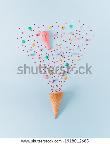 Similar – Ice cream cone with heart and moon shaped marshmallows on top