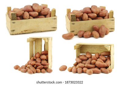 Small Red Potatoes In A Wooden Crate On A White Background