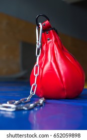 Small Red Punching Bag With Chain Close Up