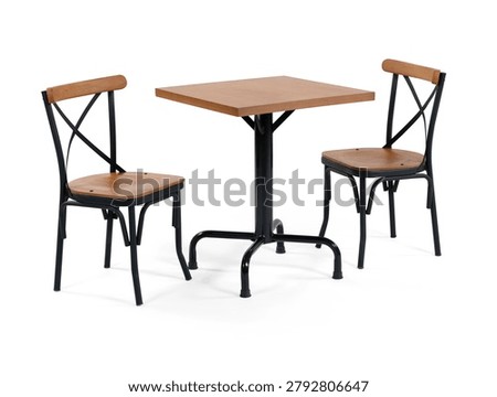 Small restaurant or cafe set consisting of a square wooden top table with a black metal pedestal base and two matching wooden cross-back metal chairs, isolated on a white background.