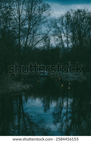 Similar – Image, Stock Photo bare tree reflected in blue lime lake, former limestone quarry