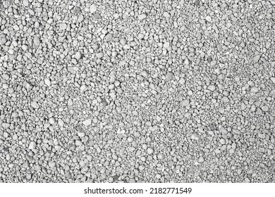 Small Rocks Ground Texture Background. White Road Stone. Gravel Pebbles Stone Texture. Crushed Granite. Close Up. Grey Clumping Clay. Cat Litter