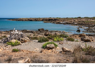 Small rocky beaches with clear and turquoise water in the natural oasis of Vendicari