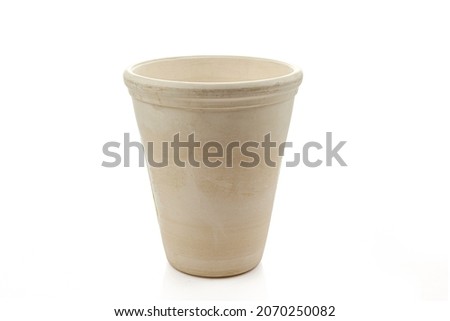 Small rough texture vase. Brown flowerpot isolated on white background