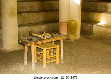 A small rough wooden table with Torah Scroll in the Synagogue in the open air museum of Nazareth Village Israel. This site gives alook at the life and times of Jesus in 1st Century Nazareth