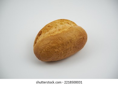 Small Round Wheat Bun Covered With Sesame Seeds, Close Up