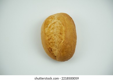 Small Round Wheat Bun Covered With Sesame Seeds, Close Up