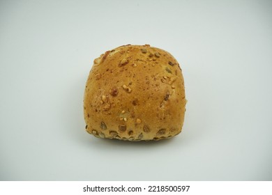 Small Round Wheat Bun Covered With Sesame Seeds, Close Up