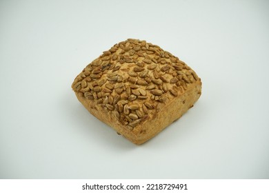 Small Round Wheat Bun Covered With Sesame Seeds, Close Up