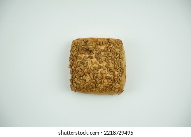 Small Round Wheat Bun Covered With Sesame Seeds, Close Up