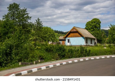 A Small Rural House Near An Asphalt Road In A Ukrainian Village