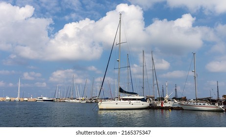 Small Sailing Boats Are Parked At The Pier In A Quiet Lagoon In A Small Greek Town Rethymnon