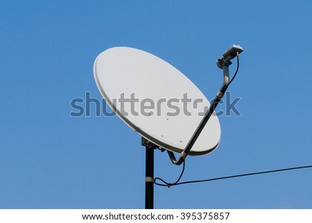 small satellite dish on blue sky