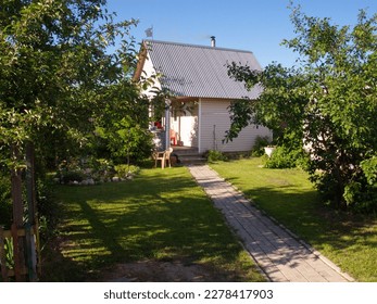 Small sauna in a rural garden on a summer morning. Ryazan region Russia - Shutterstock ID 2278417903