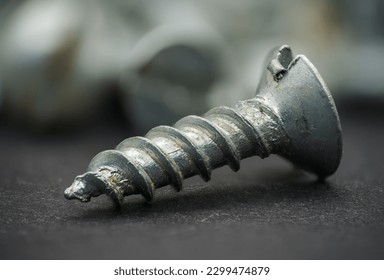 Small screw in macro close up, shallow DOF.