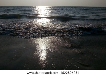 small sea waves in evening 
