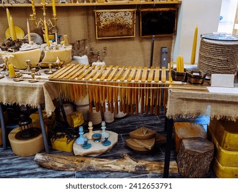 small shop selling handmade beeswax candles - Powered by Shutterstock