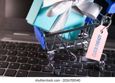 Small Shopping Cart With A Gift Inside And A Click Frenzy Tag