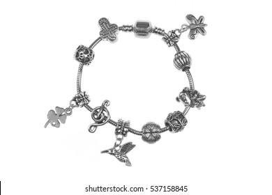 Small Silver Charm Bracelet With Many Charms Isolated On White Background