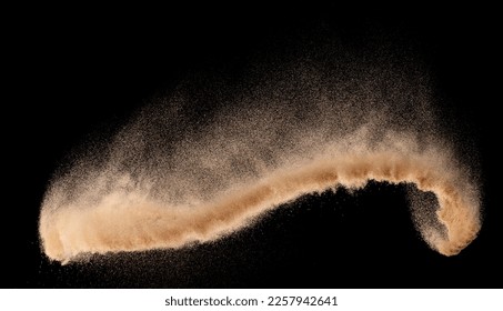 Small size fine Sand flying explosion, Golden grain wave explode. Abstract cloud fly. Yellow colored sand splash silica in Air, Galaxy star universe sign symbol. Element Black background Isolated - Shutterstock ID 2257942641