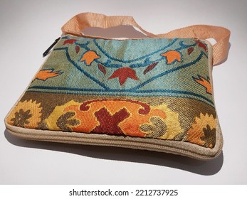 Small Sling Bag Made From Woven Fabric With Batik Motif On Isolated White