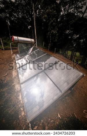 small solar heater with solar panels installed in rural areas of Brazil careless and precarious equipment 商業照片 © 
