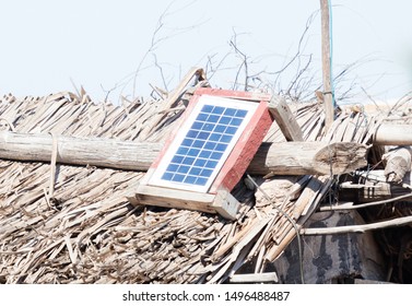 Small solar panel on a large roof in Madagascar, green energy