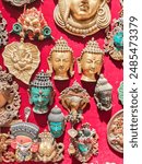 Small souvenir Ganesha and other Gods heads magnets sold at the gift store in Kathmandu. Nepal