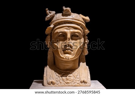 A small square pillar bust unearthed from Pompeii, Italy