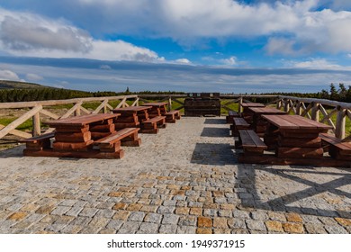 Small Square With Wooden Tables And Benches Next To Mountain Trail At Giant Mountains