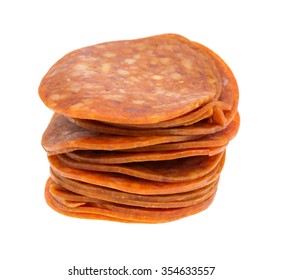 A Small Stack Of Pepperoni Slices Isolated On A White Background.