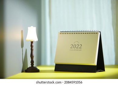 Small Stand Lamp And 2022 Desk Calendar