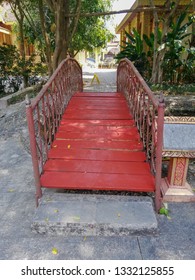 Small Steel Bridge With Red Wood Floor Panels