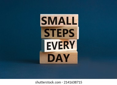 Small steps every day symbol. Concept words Small steps every day on wooden blocks. Beautiful grey table grey background. Small steps every day business concept. Copy space. - Shutterstock ID 2141638715