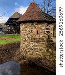 Small stone tower with a lake in the old style