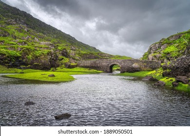 Small Stone Wishing Bridge Over Lake In Green Valley, Gap Of Dunloe In Black Valley, Ring Of Kerry, County Kerry, Ireland