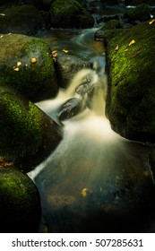 Small stream flowing between rocks