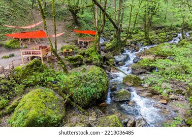 Small Stream And An Open Air Restaurant Near Rudkhan Castle In Iran