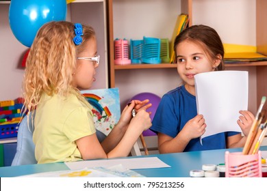 Small Students Painting In Art School Class. Child Drawing By Paints On Table. Kid On Balloons Background. Top View Of Girl In Kindergarten. Newcomer In Children's Team. Kids In Prep School.