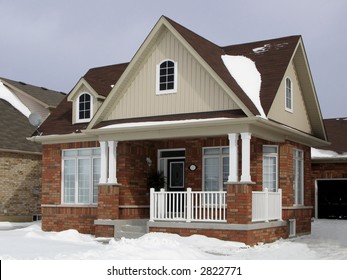 A small suburban house in winter.