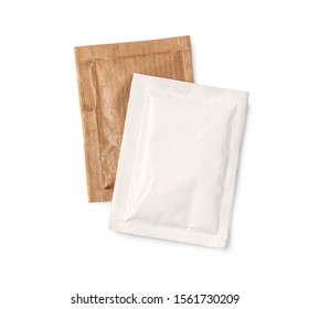 Small sugar packets isolated on white, with clipping path
