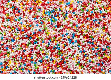 Small sweet sugar ball pattern. Food colored ball. 