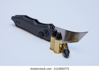 Small Tactical Knife And 9mm Handgun Ammo.