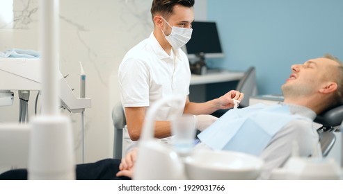 Small Talk Between Patient And Dentist, Preparing For The Dental Check Up At The Dental Office. Regular Visit To The Orthodontist. 4k Video Screenshot, Please Use In Small Size